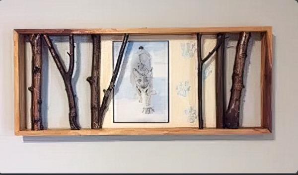 Stalking Lynx by Glen Loates in a rustic birch frame